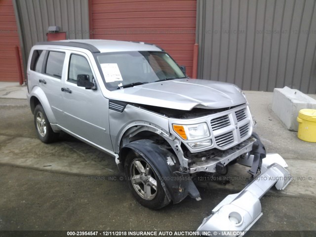 1D4PU5GK6BW575763 - 2011 DODGE NITRO SXT SILVER photo 1