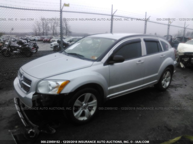 1B3CB3HA4BD262624 - 2011 DODGE CALIBER MAINSTREET SILVER photo 2