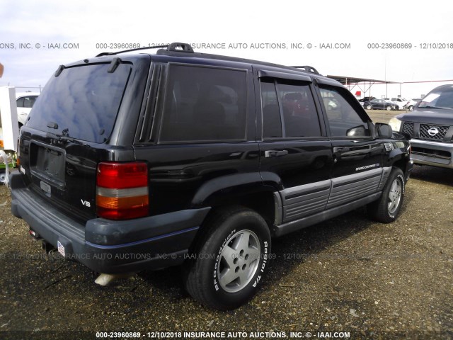 1J4GX58Y1VC654975 - 1997 JEEP GRAND CHEROKEE LAREDO/TSI BLACK photo 4