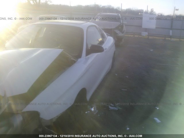 KMHJG25F31U235071 - 2001 HYUNDAI TIBURON WHITE photo 2