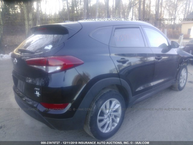 KM8J3CA42GU142850 - 2016 HYUNDAI TUCSON LIMITED/SPORT AND ECO/SE BLACK photo 4