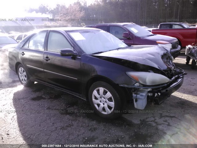 4T1BE32K32U048450 - 2002 TOYOTA CAMRY LE/XLE/SE BLACK photo 1