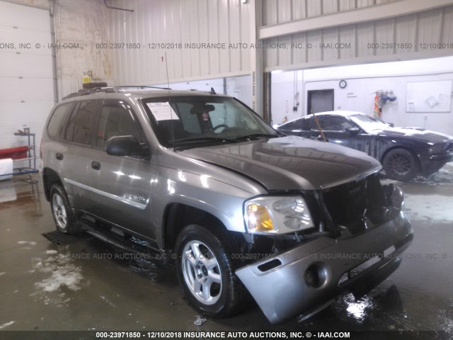 1GKDS13S662352922 - 2006 GMC ENVOY SILVER photo 1