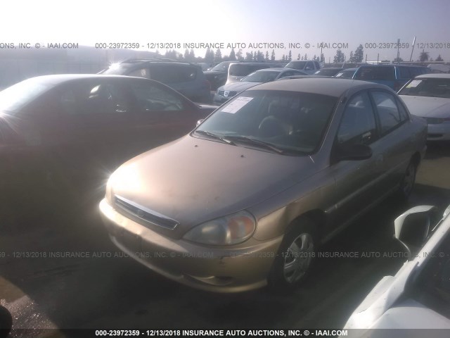 KNADC123216081827 - 2001 KIA RIO GOLD photo 2