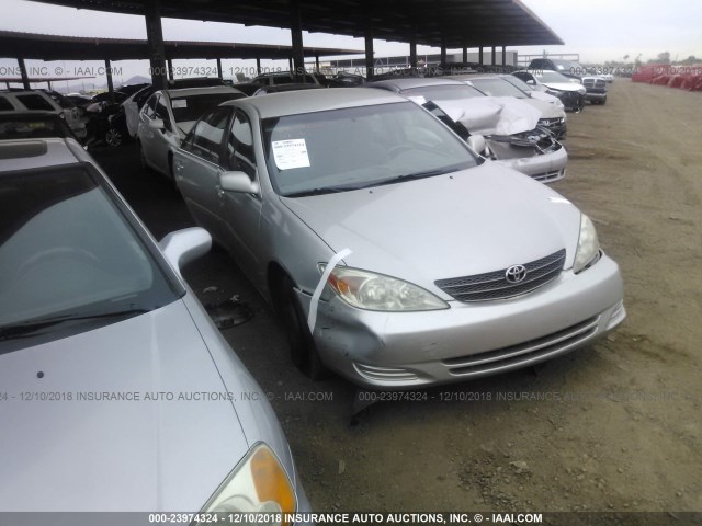 4T1BE32K72U552340 - 2002 TOYOTA CAMRY LE/XLE/SE SILVER photo 1