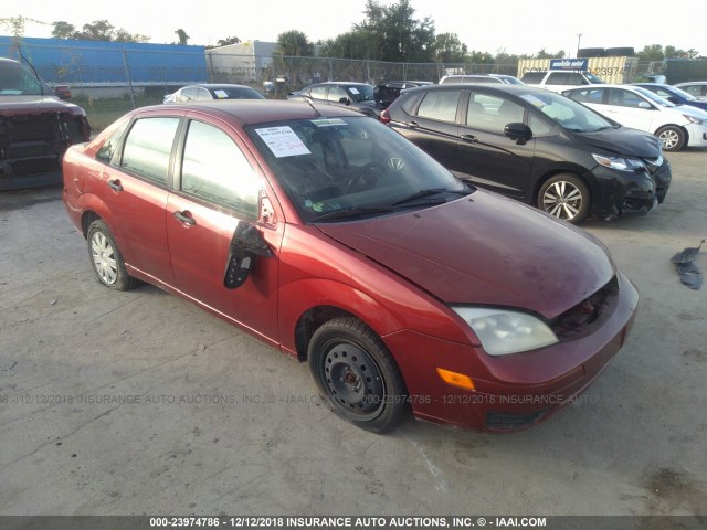 1FAFP34N55W179076 - 2005 FORD FOCUS ZX4 RED photo 1
