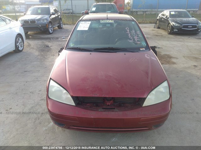 1FAFP34N55W179076 - 2005 FORD FOCUS ZX4 RED photo 6