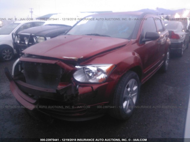 1B3HB48B57D553807 - 2007 DODGE CALIBER SXT ORANGE photo 2