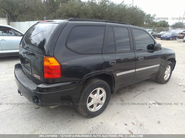 1GKDS13S582175153 - 2008 GMC ENVOY BLACK photo 4