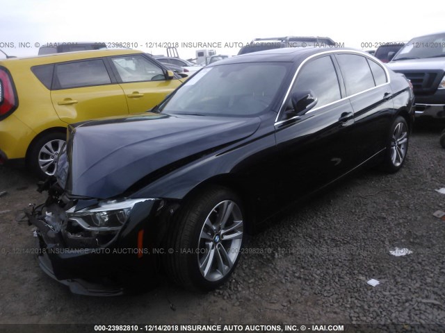 WBA8B9G51JNU96317 - 2018 BMW 330 I BLACK photo 2