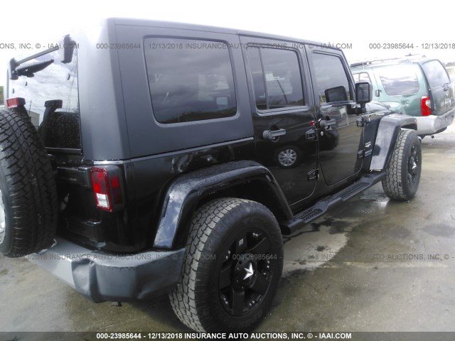 1J4HB5H15AL107014 - 2010 JEEP WRANGLER UNLIMITE SAHARA BLACK photo 4