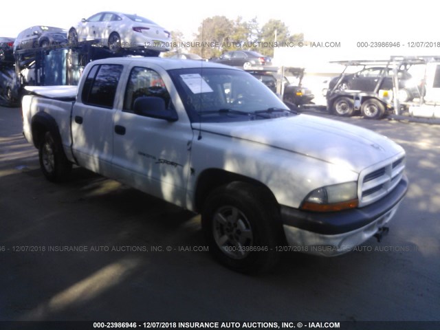 1B7GL2AZX1S114429 - 2001 DODGE DAKOTA QUAD WHITE photo 1