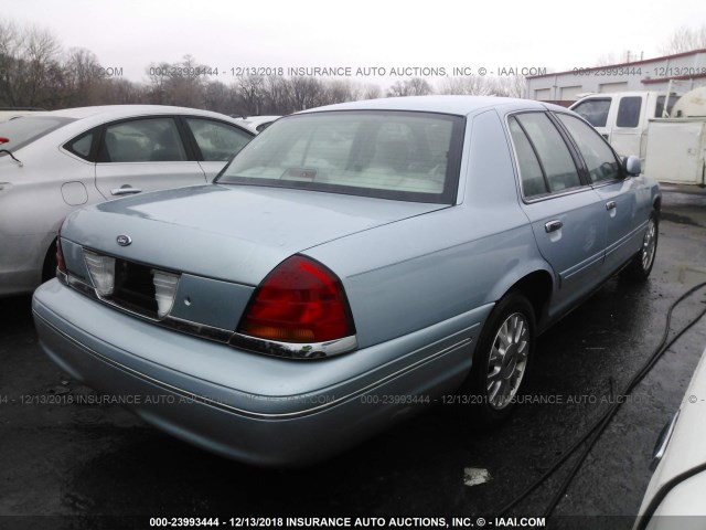 2FAFP74WX3X129632 - 2003 FORD CROWN VICTORIA LX Light Blue photo 4