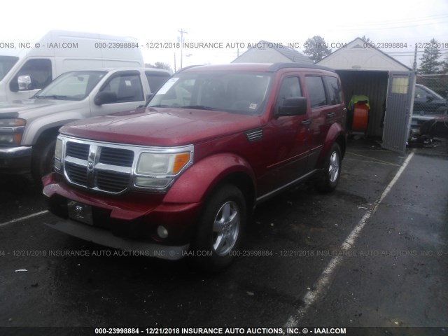 1D8GU28K89W529759 - 2009 DODGE NITRO SE RED photo 2