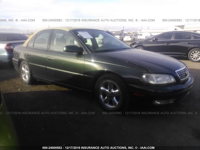 W06VR54R9YR118932 - 2000 CADILLAC CATERA GREEN photo 1