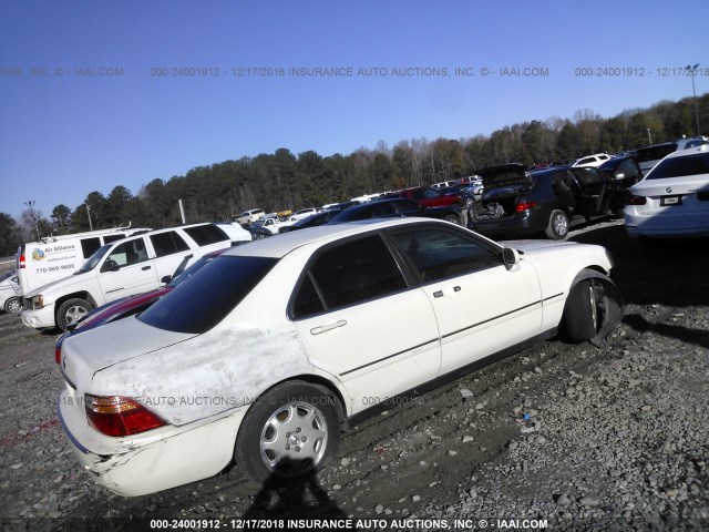 JH4KA9653XC011630 - 1999 ACURA 3.5RL WHITE photo 4