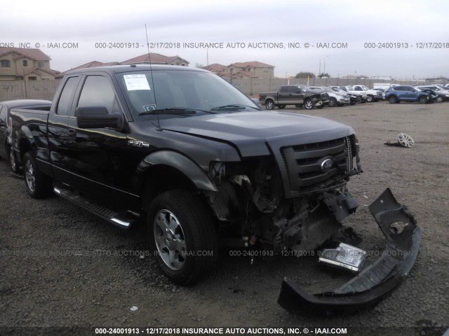 1FTEX1CW9AKA22852 - 2010 FORD F150 SUPER CAB BLACK photo 1