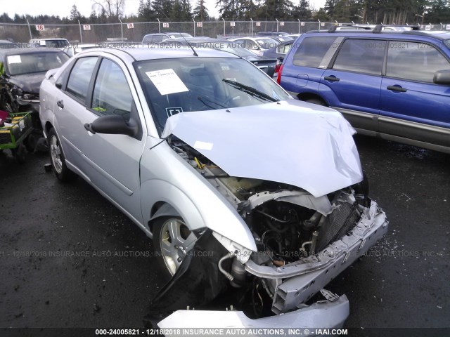 1FAFP34N25W133950 - 2005 FORD FOCUS ZX4 SILVER photo 1