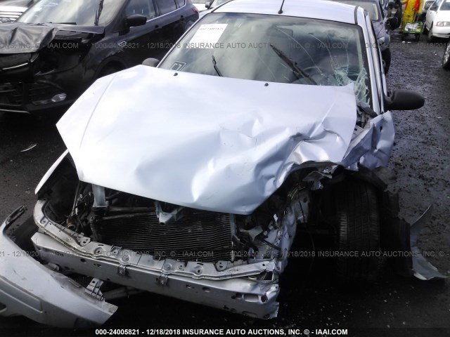 1FAFP34N25W133950 - 2005 FORD FOCUS ZX4 SILVER photo 6