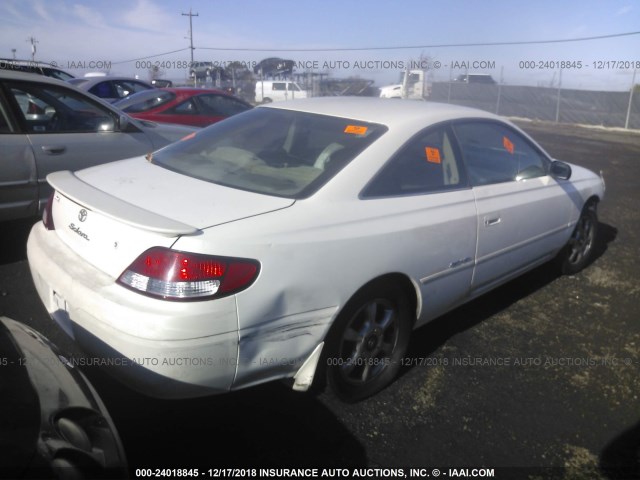 2T1CF22P11C456114 - 2001 TOYOTA CAMRY SOLARA SE/SLE WHITE photo 4