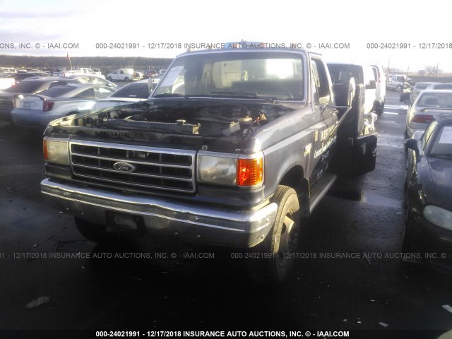 2FDLF47M2LCA92667 - 1990 FORD F SUPER DUTY BLUE photo 2