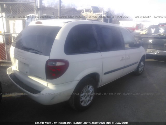 1B4GP45302B709942 - 2002 DODGE CARAVAN SPORT WHITE photo 4