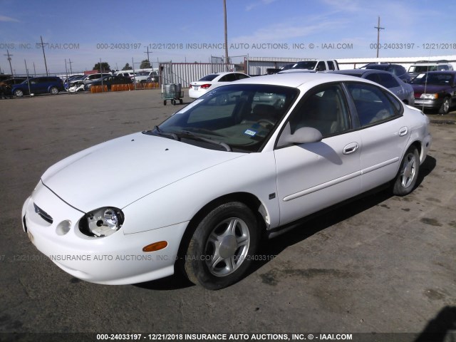 1FAFP53S4XA181727 - 1999 FORD TAURUS SE/COMFORT/SPORT WHITE photo 2