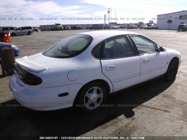 1FAFP53S4XA181727 - 1999 FORD TAURUS SE/COMFORT/SPORT WHITE photo 4