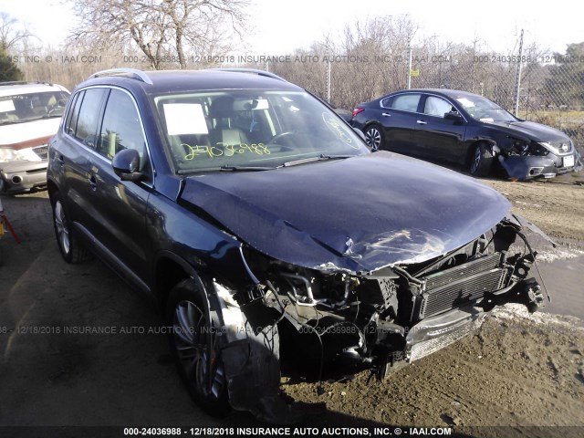 WVGBV7AX4CW546621 - 2012 VOLKSWAGEN TIGUAN S/SE/SEL BLACK photo 1