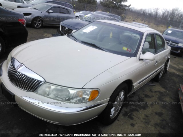 1LNHM97V51Y692512 - 2001 LINCOLN CONTINENTAL  GOLD photo 2