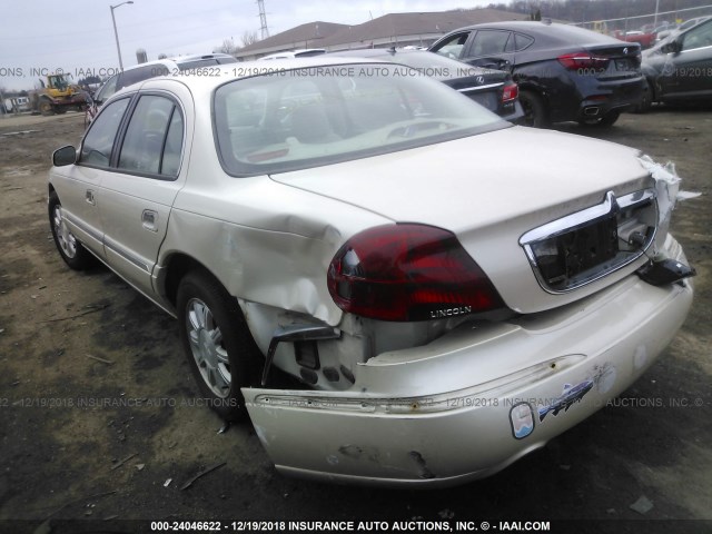 1LNHM97V51Y692512 - 2001 LINCOLN CONTINENTAL  GOLD photo 3