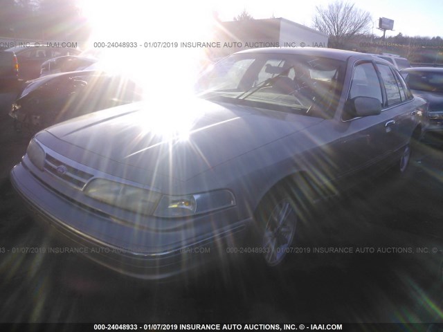 2FALP73W2VX233281 - 1997 FORD CROWN VICTORIA  TAN photo 2