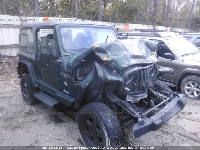 1J4FA59S6YP778292 - 2000 JEEP WRANGLER / TJ SAHARA GREEN photo 1