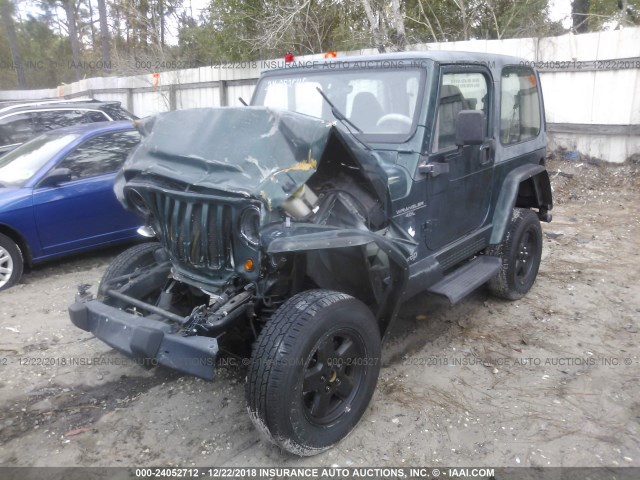 1J4FA59S6YP778292 - 2000 JEEP WRANGLER / TJ SAHARA GREEN photo 2