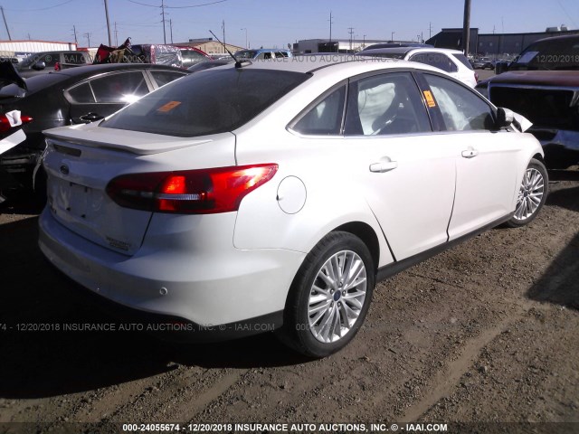 1FADP3J20GL252666 - 2016 FORD FOCUS TITANIUM WHITE photo 4