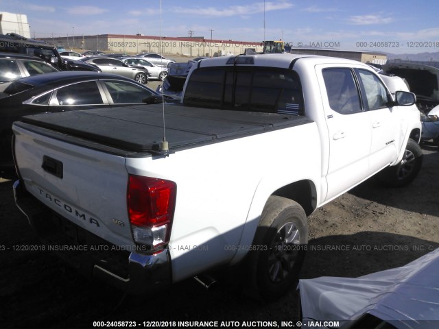 3TMAZ5CN7HM037909 - 2017 TOYOTA TACOMA DBL CAB/SR5/TRD SPORT/OR WHITE photo 4