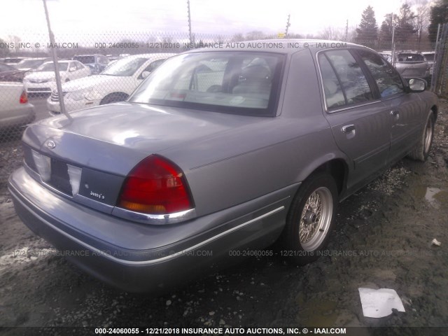 2FAFP74W8YX141284 - 2000 FORD CROWN VICTORIA LX GRAY photo 4