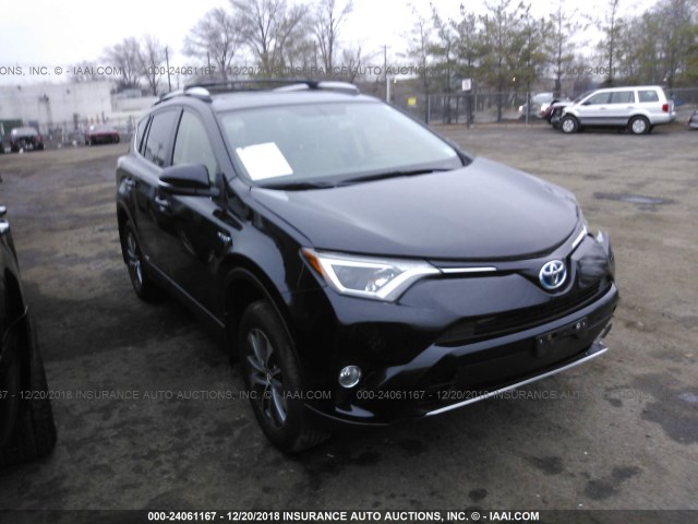 JTMRJREV8GD004880 - 2016 TOYOTA RAV4 HV XLE BLACK photo 1