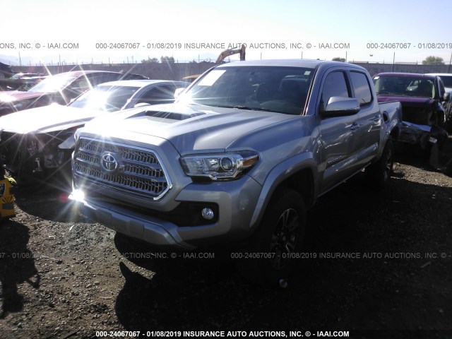 3TMCZ5ANXGM025683 - 2016 TOYOTA TACOMA DBL CAB/SR/SR5/TRD SPT/OR SILVER photo 2