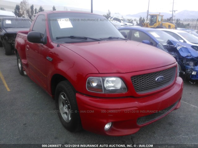 2FTZF0730XCA95068 - 1999 FORD F150 SVT LIGHTNING RED photo 1