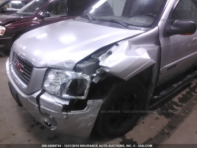 1GKDT13S142427875 - 2004 GMC ENVOY SILVER photo 6