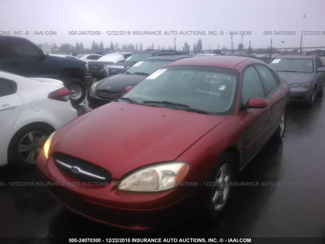 1FAFP55U4YG245410 - 2000 FORD TAURUS SES RED photo 2