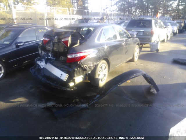 4T1BF1FK8FU091585 - 2015 TOYOTA CAMRY LE/XLE/SE/XSE BLACK photo 4