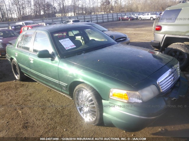 2FAFP73W0YX210292 - 2000 FORD CROWN VICTORIA  GREEN photo 1