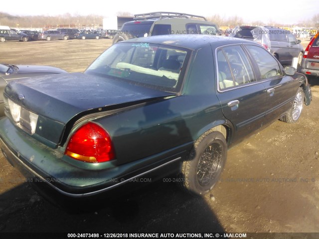 2FAFP73W0YX210292 - 2000 FORD CROWN VICTORIA  GREEN photo 4