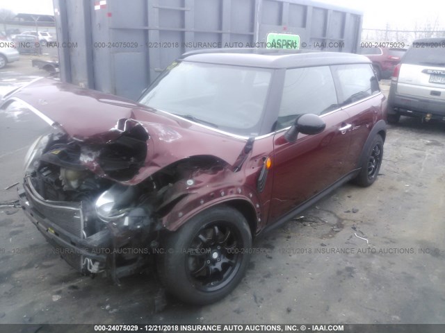 WMWML33569TX35866 - 2009 MINI COOPER CLUBMAN RED photo 2