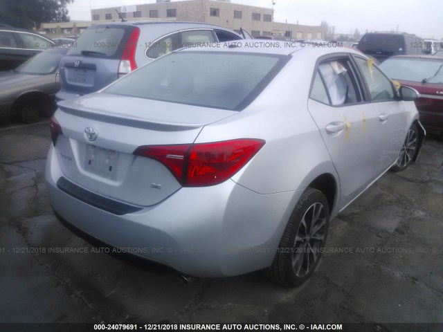 5YFBURHE5HP619079 - 2017 TOYOTA COROLLA L/LE/XLE/SE/XSE SILVER photo 4