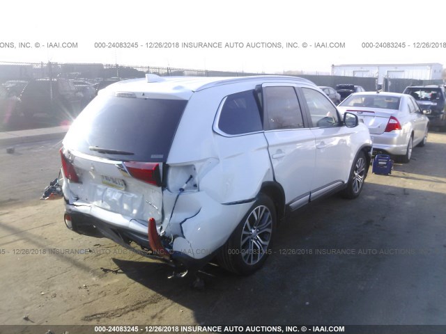 JA4AZ3A31HZ008517 - 2017 MITSUBISHI OUTLANDER SE/SEL WHITE photo 4