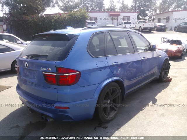 5YMGY0C56BLK26115 - 2011 BMW X5 M BLUE photo 4