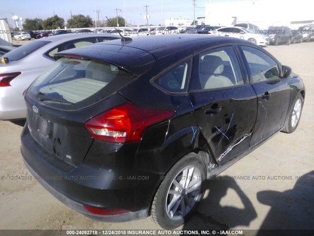 1FADP3K26JL283555 - 2018 FORD FOCUS SE შავი ფოტო 4